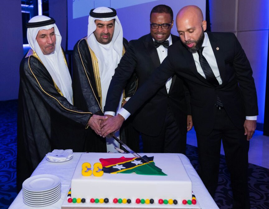Cutting the cake the traditional UAE way with a sword