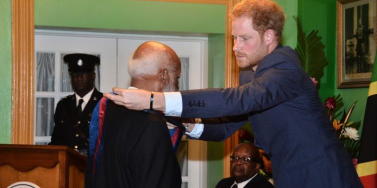 FORMER GOVERNOR GENERAL SIR EDMUND LAWRENCE FORMALLY RECEIVES KNIGHTHOOD FROM PRINCE HARRY