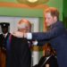 FORMER GOVERNOR GENERAL SIR EDMUND LAWRENCE FORMALLY RECEIVES KNIGHTHOOD FROM PRINCE HARRY