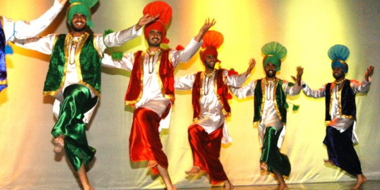 Prime Minister Dr. the Honourable Timothy Harris meets the Asian Punjabi Folk Dance Club