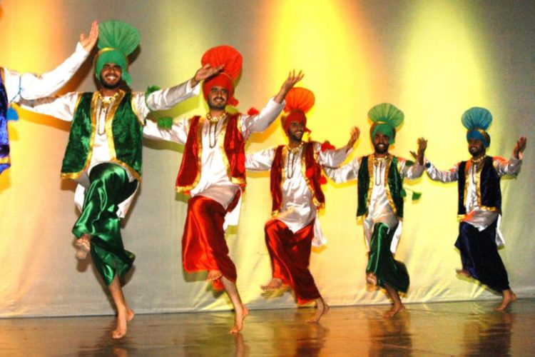 Prime Minister Dr. the Honourable Timothy Harris meets the  Asian Punjabi Folk Dance Club