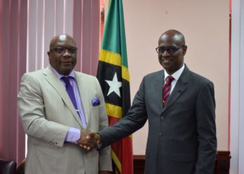 PM HARRIS RECEIVES COURTESY CALL FROM HIS LORDSHIP JUSTICE TREVOR WARD, QC AND PRESENTS HIM WITH LEADING LAW BOOKS