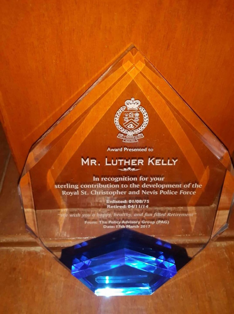 Award presented to Inspector (Retired) Luther Kelly.