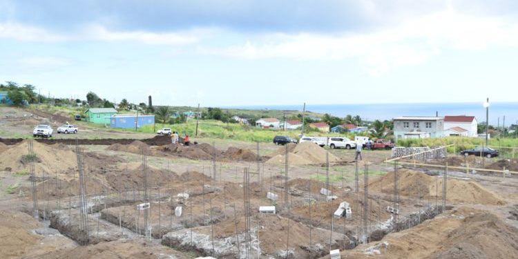 MINISTER HAMILTON REPORTS ON PROGRESS OF HOUSING PROJECT IN CAYON