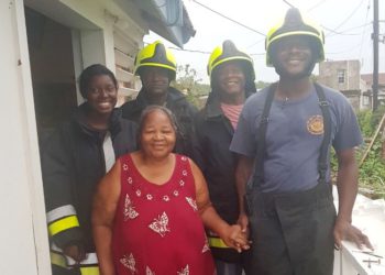 FIRE AND RESCUE SERVICES LENDS HELPING HAND TO HURRICANE-AFFECTED SENIOR CITIZEN
