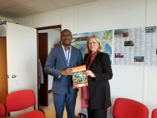 Minister Richards Presents SKN Slave Route Text: Places of Memory" to Director of the Division for UNESCO World Heritage Sector