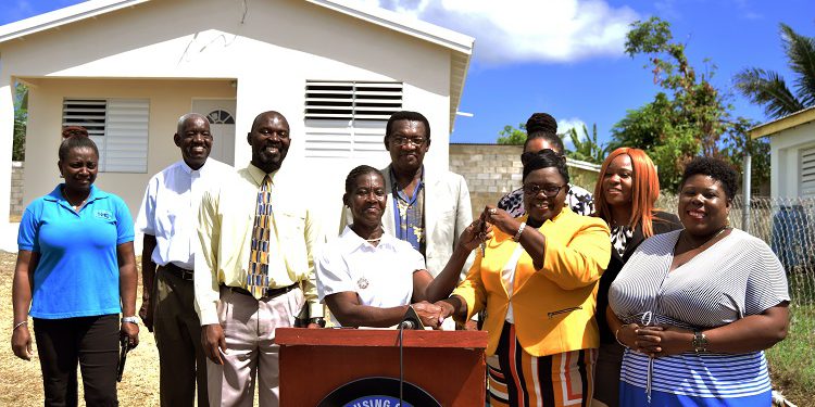 PAMELLA CORNELIUS RECEIVES KEYS TO NEWLY RENOVATED HOUSE