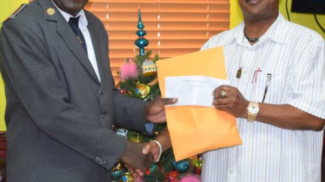POLICE OFFICERS IN ST. KITTS AND NEVIS DONATE TO CHARITY