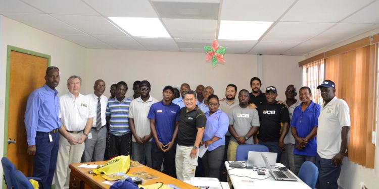MACHINE OPERATORS AND MECHANICS AT PUBLIC WORKS DEPARTMENT RECEIVE TRAINING ON USE OF NEWLY PURCHASED EXCAVATOR