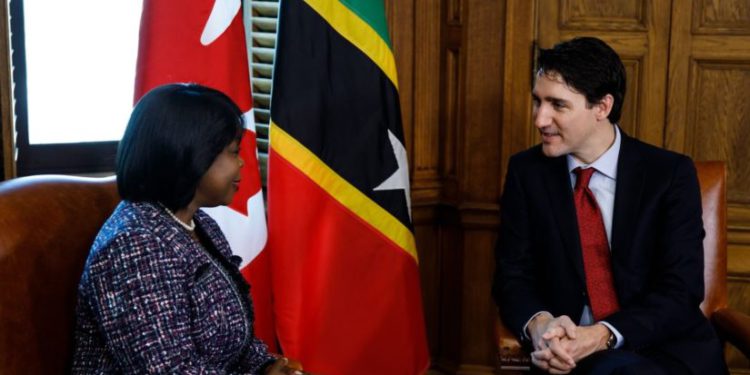 High Commissioner Sherry Tross presents letters of introduction to Canadian Prime Minister Justin Trudeau