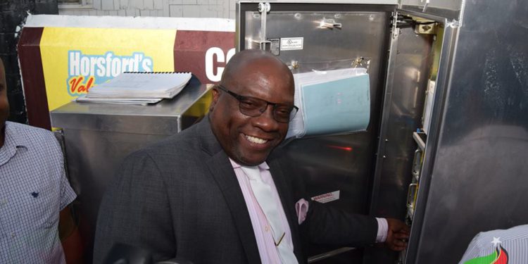 PRIME MINISTER HARRIS OFFICIALLY FLICKS ON TRAFFIC LIGHTS IN BASSETERRE