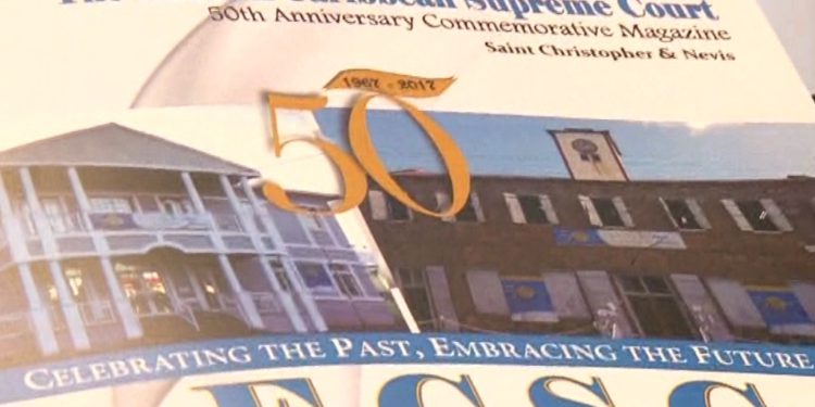 SIR TAPLEY PRESENTED WITH FIRST OFFICIAL COPY OF MAGAZINE IN COMMEMORATION OF ECSC’S 5OTH ANNIVERSARY CELEBRATIONS