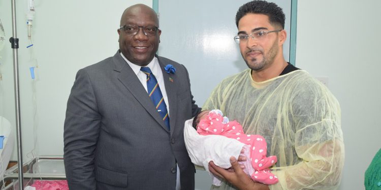 PM HARRIS CONGRATULATES LIME KILN COUPLE ON BIRTH OF BOUNCING INDEPENDENCE 35 BABY GIRL