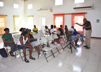 Dr Chitan empowering Nevis STEP environmental workers through social skill training
