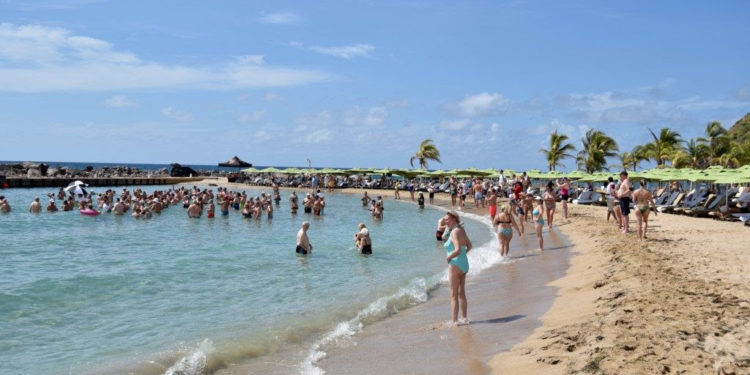 MINISTER GRANT URGES CITIZENS AND RESIDENTS TO HELP KEEP TOURISM MOMENTUM GOING STRONG