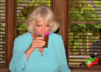 THE DUCHESS OF CORNWALL TREATED TO ROYAL RUM PUNCH AT THE HERMITAGE PLANTATION INN IN NEVIS
