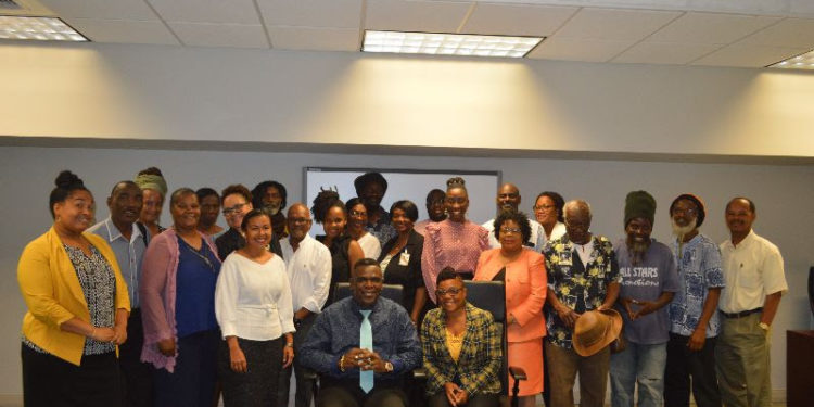 (Center L-R): Secretary General of the St. Kitts-Nevis National Commission for UNESCO, Antonio Maynard and Incoming Secretary General of the St. Kitts-Nevis National Commission for UNESCO, Mrs. Dorothy Warner with staff and stakeholders.