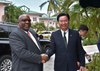 Prime Minister Dr. the Hon. Timothy Harris greets Minister of Foreign Affairs of the Republic of China (Taiwan), the Honourable Dr. Jaushieh Joseph Wu.