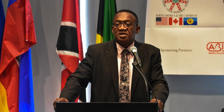 Minister of Social Development, the Honourable Eugene Hamilton