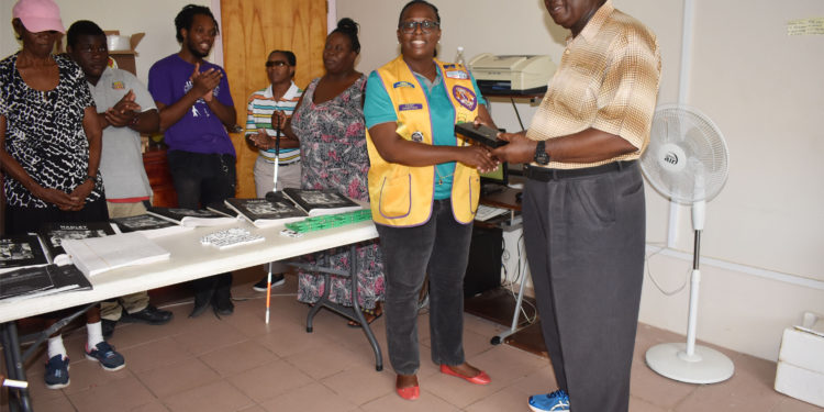 St. Kitts (Basseterre) Lions Club gifts braille items and white canes to St. Kitts Society for the Blind