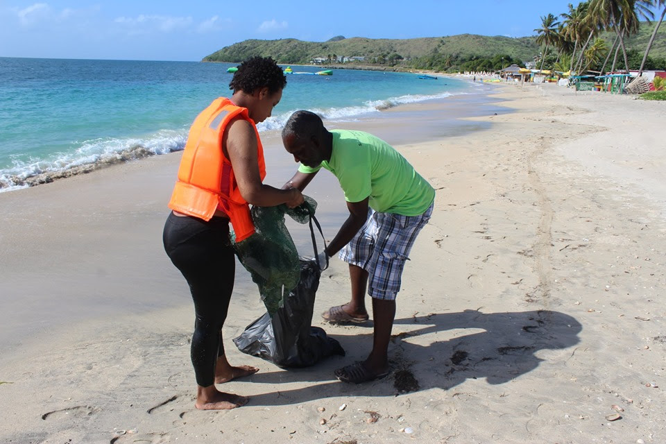 VOLUNTEERS TEAM UP TO CLEANUP COCKLESHELL BEACH ON SOUTHEAST PENINSULA