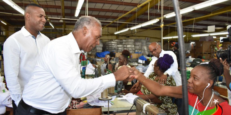 MINISTER OF LABOUR COMMENDS HARMONIOUS WORKING ENVIRONMENT AT SUN ISLAND CLOTHES LTD