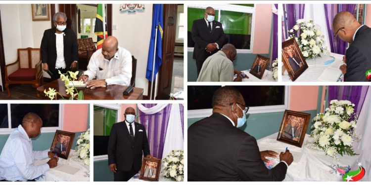 PRIME MINISTER HARRIS SIGNS BOOK OF CONDOLENCE FOR THE LATE RICHARD CAINES