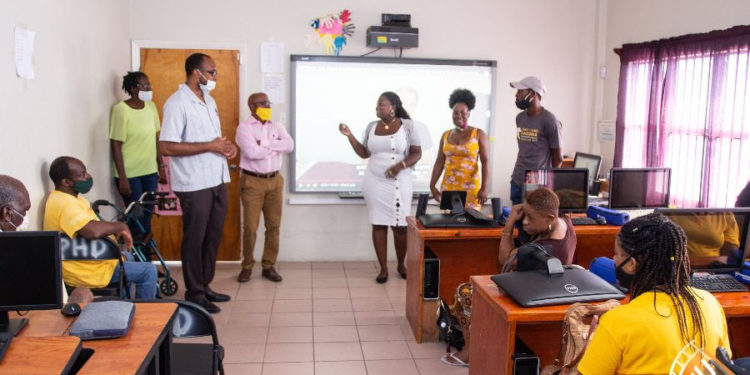 MINISTERS POWELL AND GRANT VISIT CENTRE FOR THE DISABLED IN CELEBRATION OF INTERNATIONAL DAY OF SIGN LANGUAGES