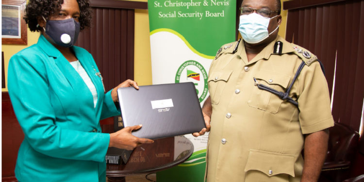 ST KITTS NEVIS SOCIAL SECURITY BOARD HANDS OVER TWO LAPTOPS TO THE ROYAL ST CHRISTOPHER & NEVIS POLICE FORCE