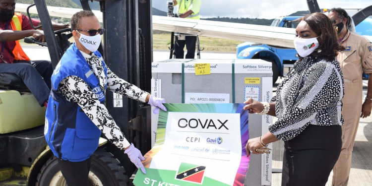 COUNTRY REPRESENTATIVE FOR PAHO PRESENTS VACCINES FROM COVAX TO ST KITTS AND NEVIS WHILE PRAISING GOVERNMENT