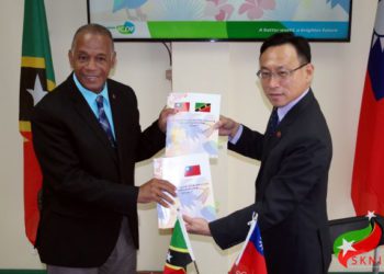 L-R: HON. ERIC EVELYN; H.E. AMBASSADOR MICHAEL LIN