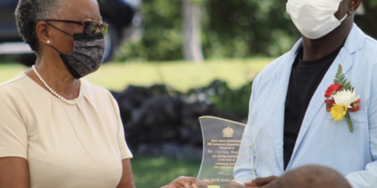 Gingerland musician Mr. Curtley Maynard honoured for contribution to Music