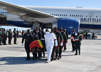 PM HARRIS AND CABINET COLLEAGUES ON HAND AS THE BODY OF H.E. VANCE WINKWORTH AMORY RETURNS TO ST. KITTS AND NEVIS