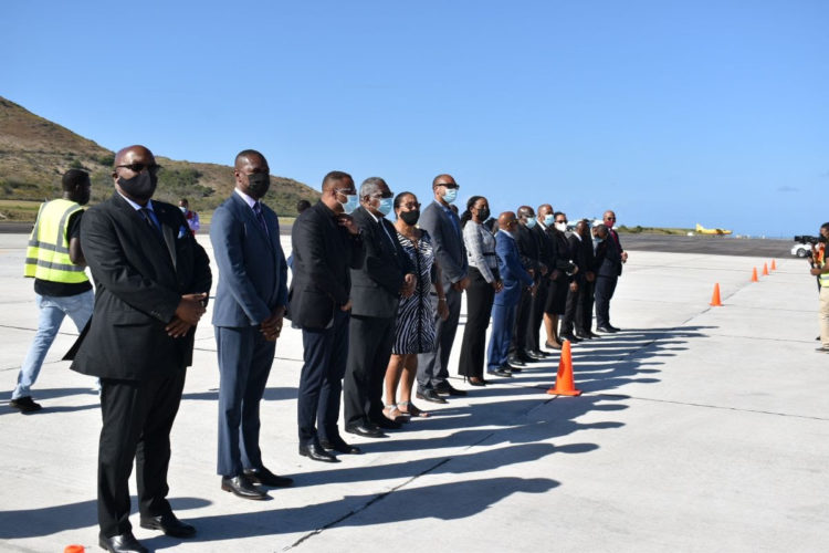 PM HARRIS AND CABINET COLLEAGUES ON HAND AS THE BODY OF H.E. VANCE WINKWORTH AMORY RETURNS TO ST. KITTS AND NEVIS