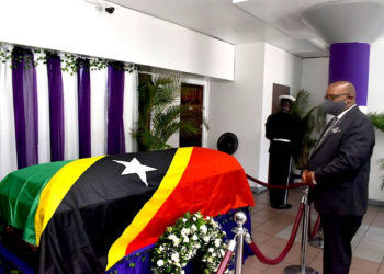 PM HARRIS CONSOLES THE FAMILY AS THE BODY OF HIS EXCELLENCY VANCE W. AMORY LIE IN STATE AT GOVERNMENT HEADQUARTERS