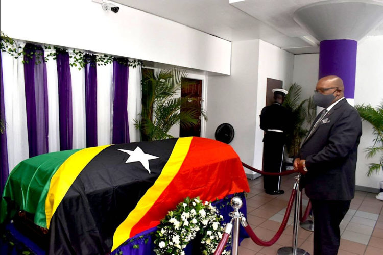 PM HARRIS CONSOLES THE FAMILY AS THE BODY OF HIS EXCELLENCY VANCE W. AMORY LIE IN STATE AT GOVERNMENT HEADQUARTERS