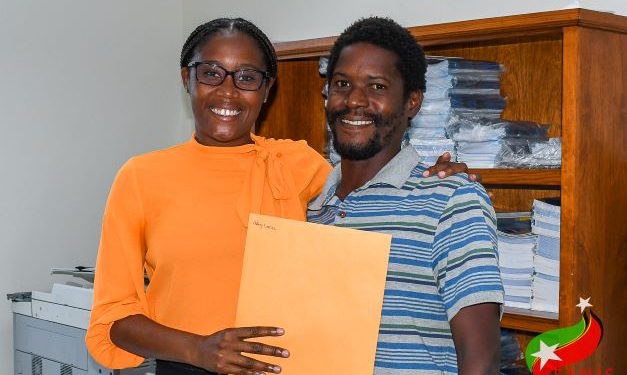 SEVEN RESIDENTS OF ABBOTS HOUSING DEVELOPMENT RECEIVE BLANK CERTIFICATES OF TITLE 