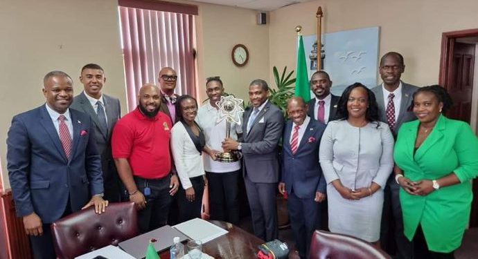 CABINET WELCOMES DWAYNE BRAVO AND THE 6IXTY CHAMPIONSHIP TROPHY