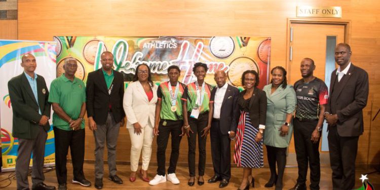 CABINET MEMBERS AND OTHER OFFICIALS GIVE A ROUSING WELCOME TO RETURNING CARIFTA ATHLETES