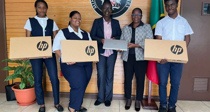 CFBC Students Receive Laptops Donated by H.E. Dr. Kevin Isaac