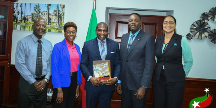 Prime Minister Drew Receives a Courtesy Call from CXC Officials