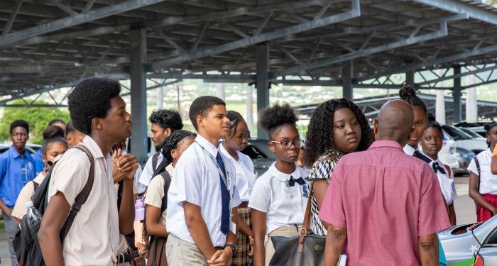 MINISTRY OF ENERGY FACILITATES EDUCATIONAL WALKTHROUGH WITH STUDENTS AT THE ECCB HEADQUARTERS