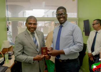 New High-Tech Passport System Unveiled; Prime Minister Drew Among the First Recipients