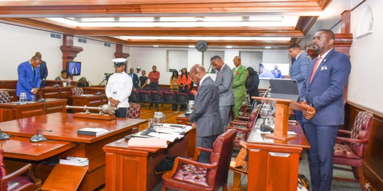 Minister Duggins Pays Emotional Tribute, Parliament Observes Silence for Cultural PillarJanet Johnson