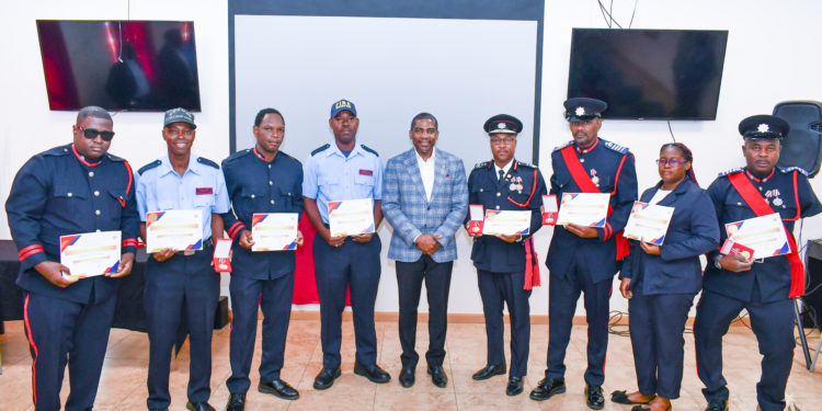 PM DREW JOINS SKNFRS IN SALUTING 11 OFFICERS FOR YEARS OF SERVICE AND SACRIFICE